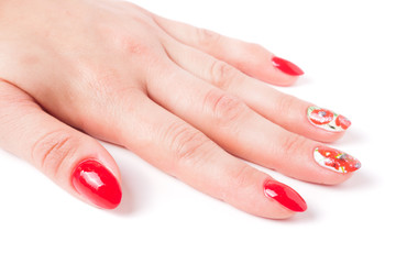 red manicure with a pattern isolated on white background