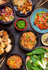 Chinese food on a dark table