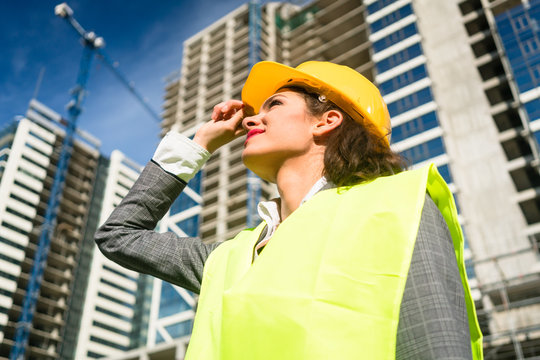 Female architect visiting construction site