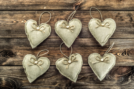 Textile decorative pillows in shape heart, christmas decoration hanging
