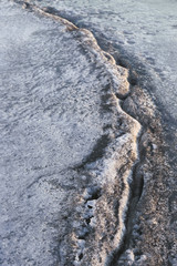 big rift in the ice on the lake closeup