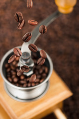 coffee drop with vintage manual coffee grinder