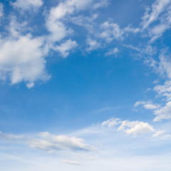 Blue sky and clouds over horizon.