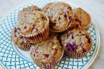 Homemade vegan muffins with zucchini and raspberries