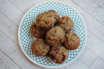 Homemade vegan muffins with zucchini and raspberries
