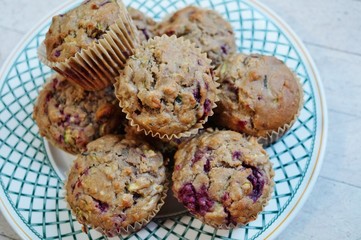 Homemade vegan muffins with zucchini and raspberries
