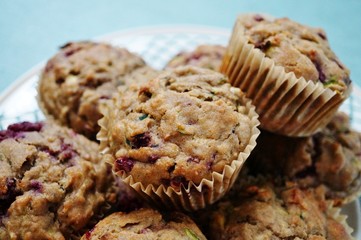 Homemade vegan muffins with zucchini and raspberries