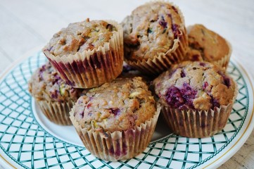 Homemade vegan muffins with zucchini and raspberries