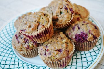 Homemade vegan muffins with zucchini and raspberries