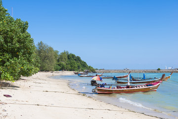 Fototapeta na wymiar Traditional long tail boat on beach