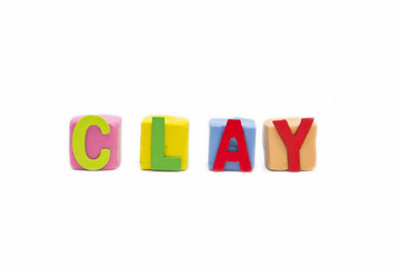 word clay by wooden letter on clay