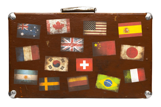Travel suitcase with stickers isolated