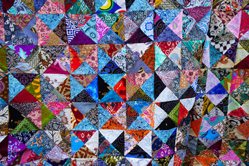 Background of colorful patchwork fabrics. 