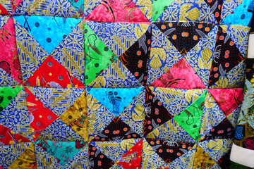 Background of colorful patchwork fabrics. 