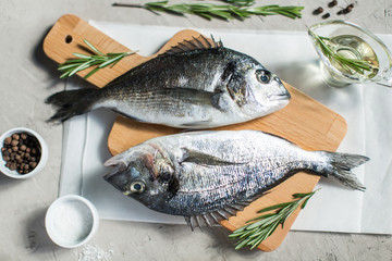 Fresh dorado fish with herbs and pepper
