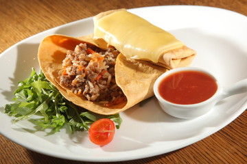 corn tortilla with meat and rice