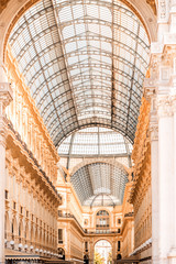 Architecture of the famous Vittorio Emanuele shopping gallery in the center of Milan city.