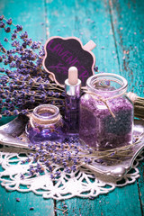 Aromatherapy oil and lavender, spa,  on a wooden background