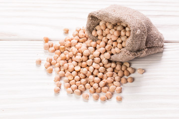 chickpeas on rustic background, healthy food concept