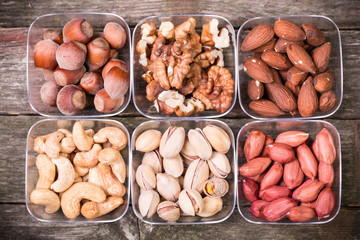 Mix nuts on wooden table,healthy vegan food.