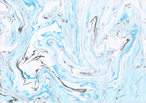 Hand made marble ink suminagashi blue gray abstract background texture