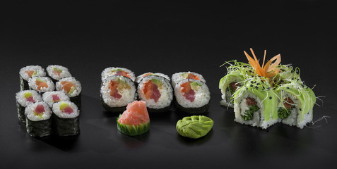 Mix colorful sushi. Uramaki and Hosomaki sushi rolls
