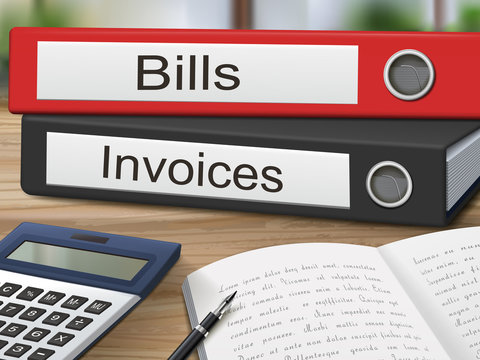 bills and invoices on binders