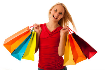 Fototapeta na wymiar Beautiful young woman with shopping bags consumerism isolated ov