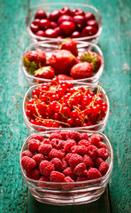 Fresh summer berries , wooden background, healthy food.
