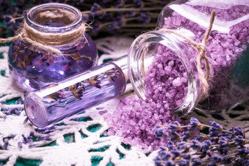 Obraz na płótnie Canvas Aromatherapy oil and lavender, spa, on a wooden background