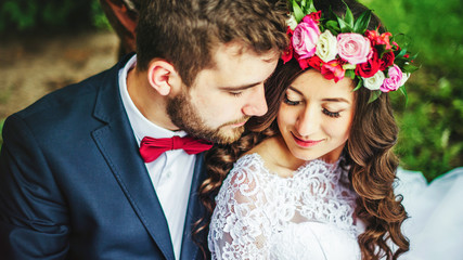 Bride & groom near old tree