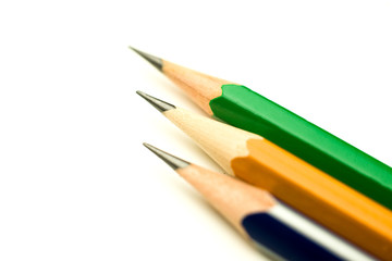 Pencils of different colors are on white.