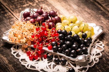 Fresh summer berries , wooden background, healthy food.