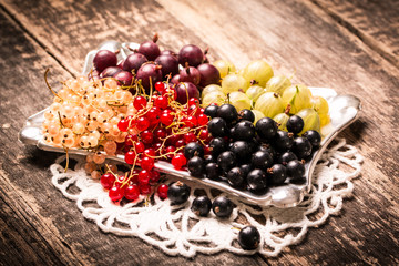 Fresh summer berries , wooden background, healthy food.