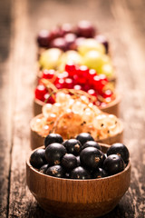 Fresh summer berries , wooden background, healthy food.