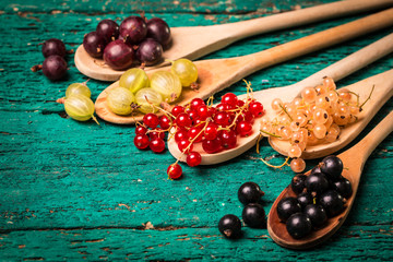 Fresh summer berries , wooden background, healthy food.