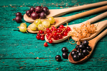 Fresh summer berries , wooden background, healthy food.
