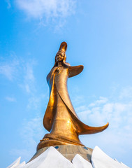 statue of Kun Iam against blue sky in macau. It is very popular with tourists and foreigners
