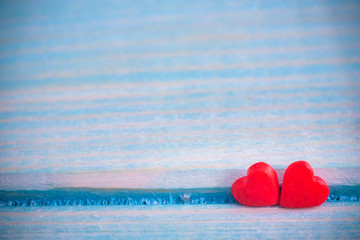 Valentines Day background with Fabric valentine heart on grunge wood table.Retro filter