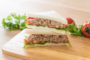 tuna sandwich on wood