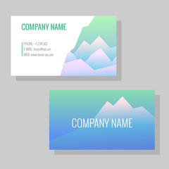 Vector template for business cards. Image of snowy mountains. Business card or flyer for a travel agency or a sports shop. Template with mountain background