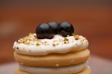 cake with berries black closeup