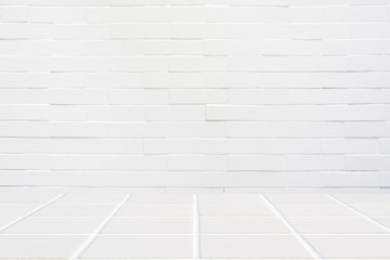 white ceramic mosaic floor and white brick wall