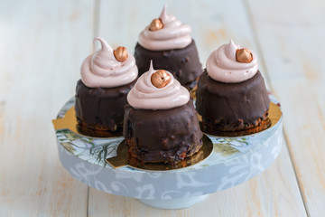 Chocolate cupcakes with Swiss meringue.