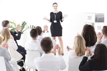 Fototapeta premium Entertaining presentation of a team leader