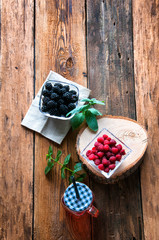 Fresh drink with raspberries and blackberries. Copyspace