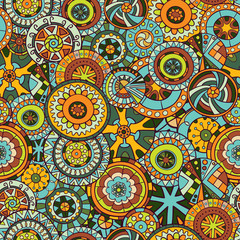Seamless pattern of hand-drawn and painted mandalas.