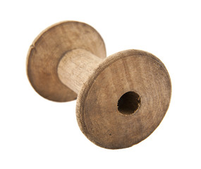 old wooden spool for threads