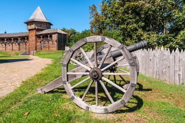 Ancient gun installed on wooden carriages