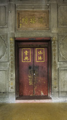 The classic door chinese style(Lucky door) and chinese art architecture in Wat Leng Nei Yee Chinese temple in Yaowarat road,Bangkok capital city,Thailand.